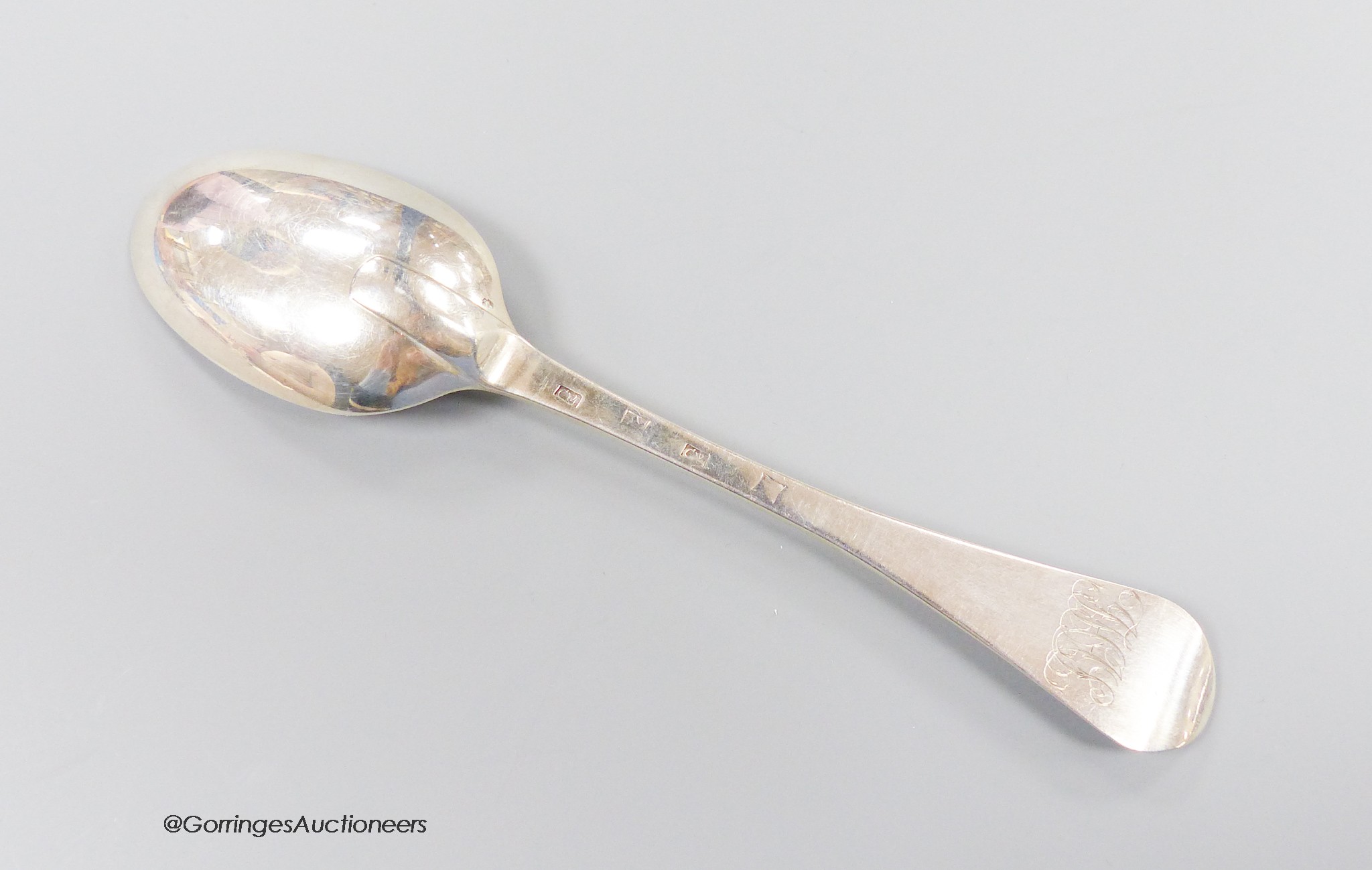 A rare 18th century Scottish provincial silver Hanovarian pattern tablespoon, Colin Mitchell, Canongate, c.1740, with engraved monogram, 20.5cm, 74 grams.